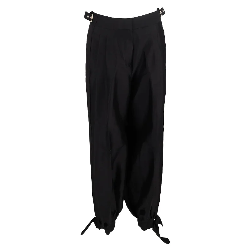 Zimmermann Pleated High-Waist with Buckle Detail Harem Trousers in Black Wool